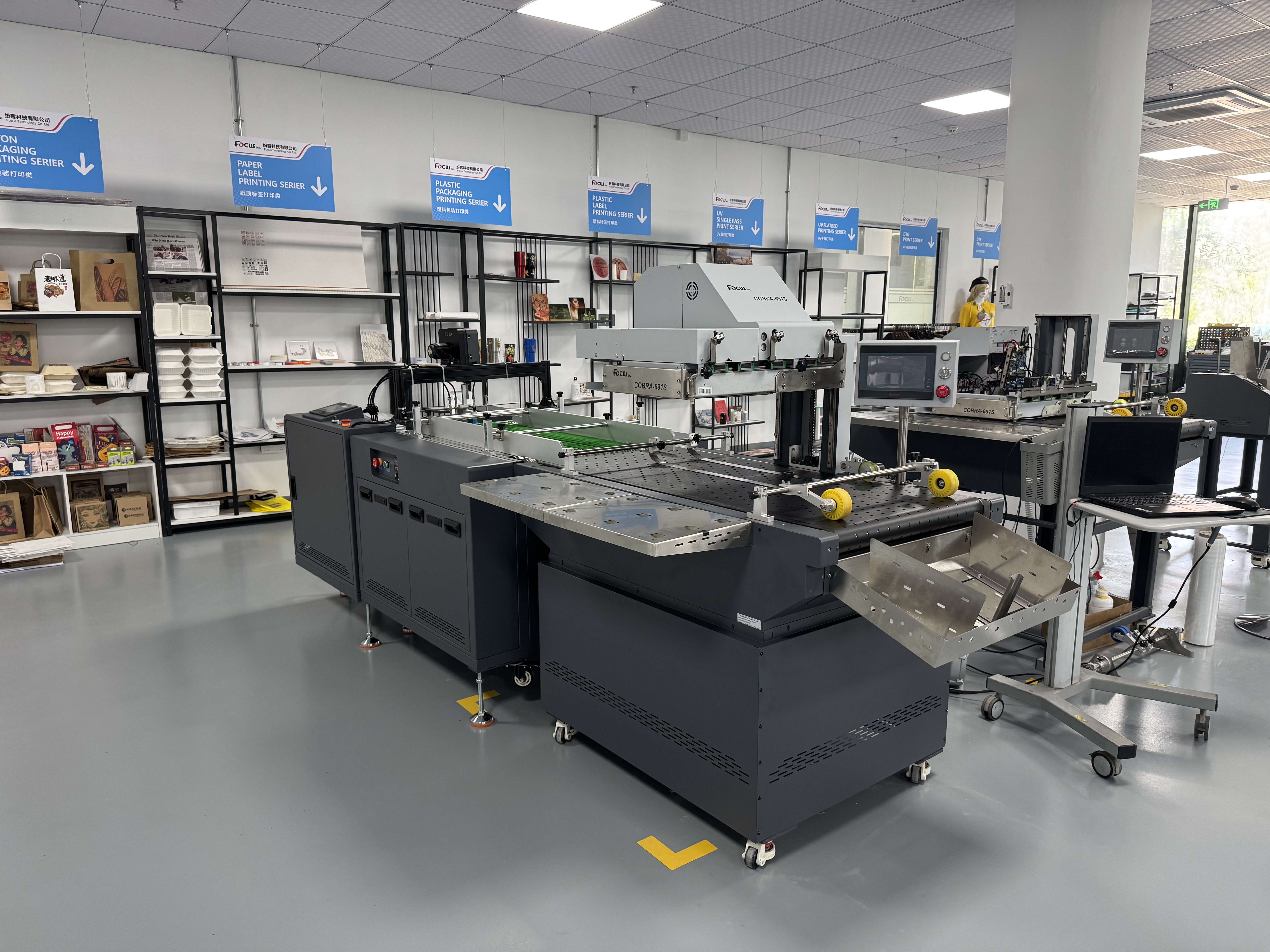 FocusInc single pass printer with auto feeding and correction system